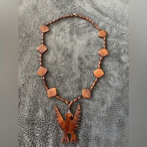 2/$20 Wooden bead necklace with bird pendant